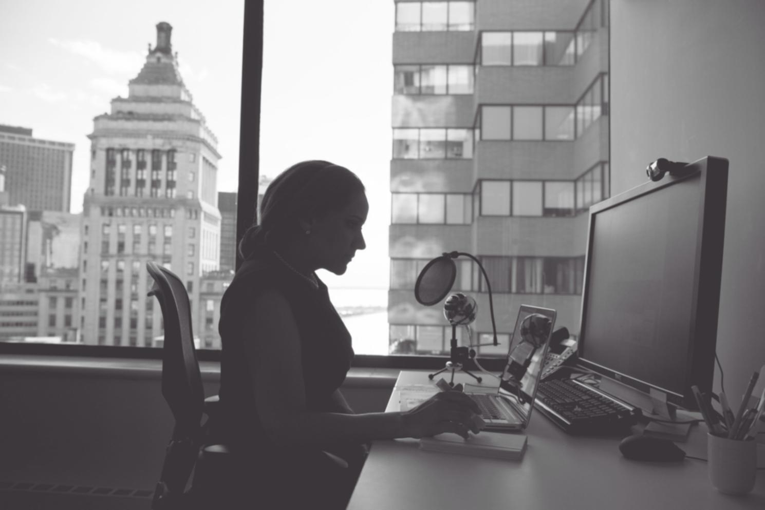 Multiple AI development interfaces and coding environments displayed on modern monitors